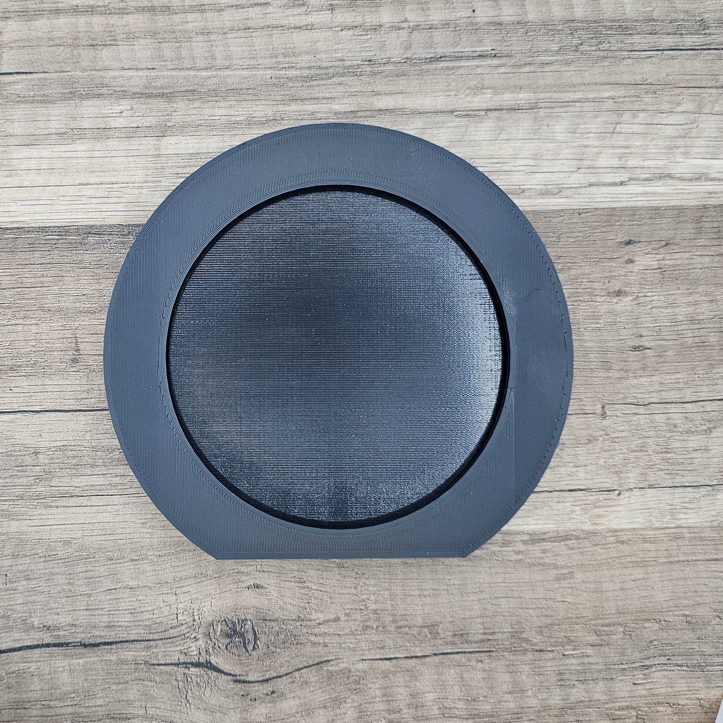 One black picture frame that hold interchangeable ears