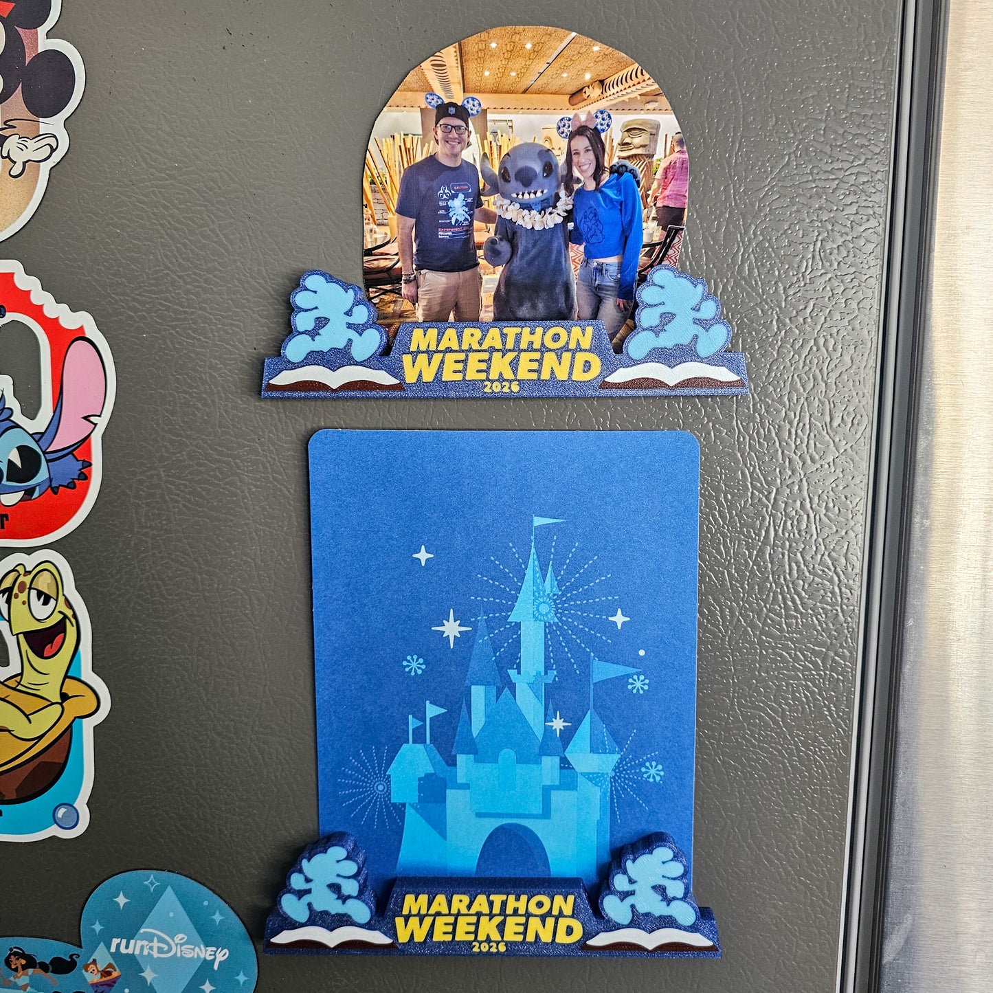 Fridge magnet with 'Marathon Weekend 2023' text and castle design on a metallic surface.